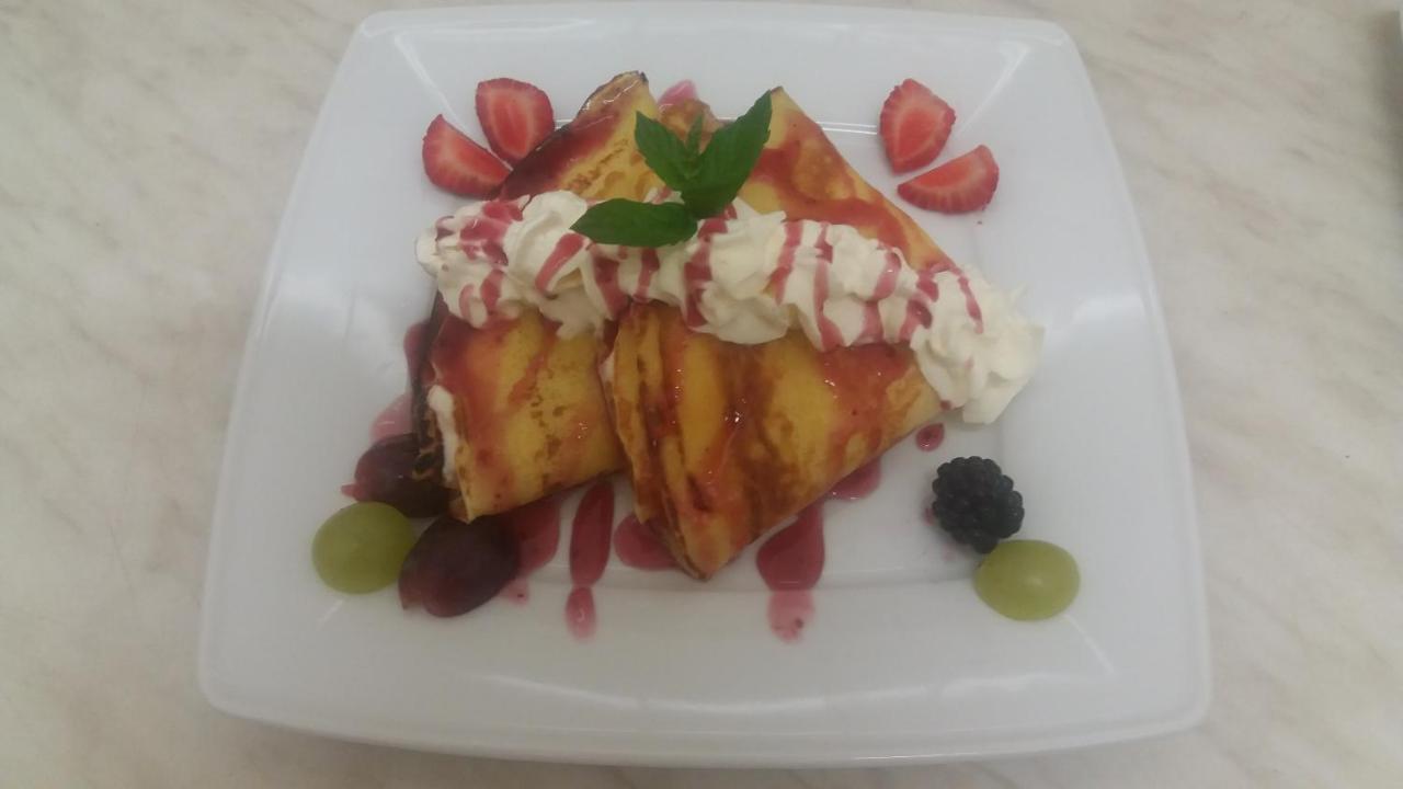 Restauracja Applause Hotel Ludwin Ngoại thất bức ảnh